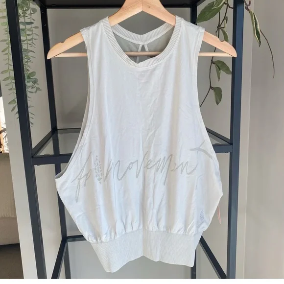 FREE PEOPLE MOVEMENT CUTOUT TANK TOP IN LIGHT GREEN - Picture 1 of 6